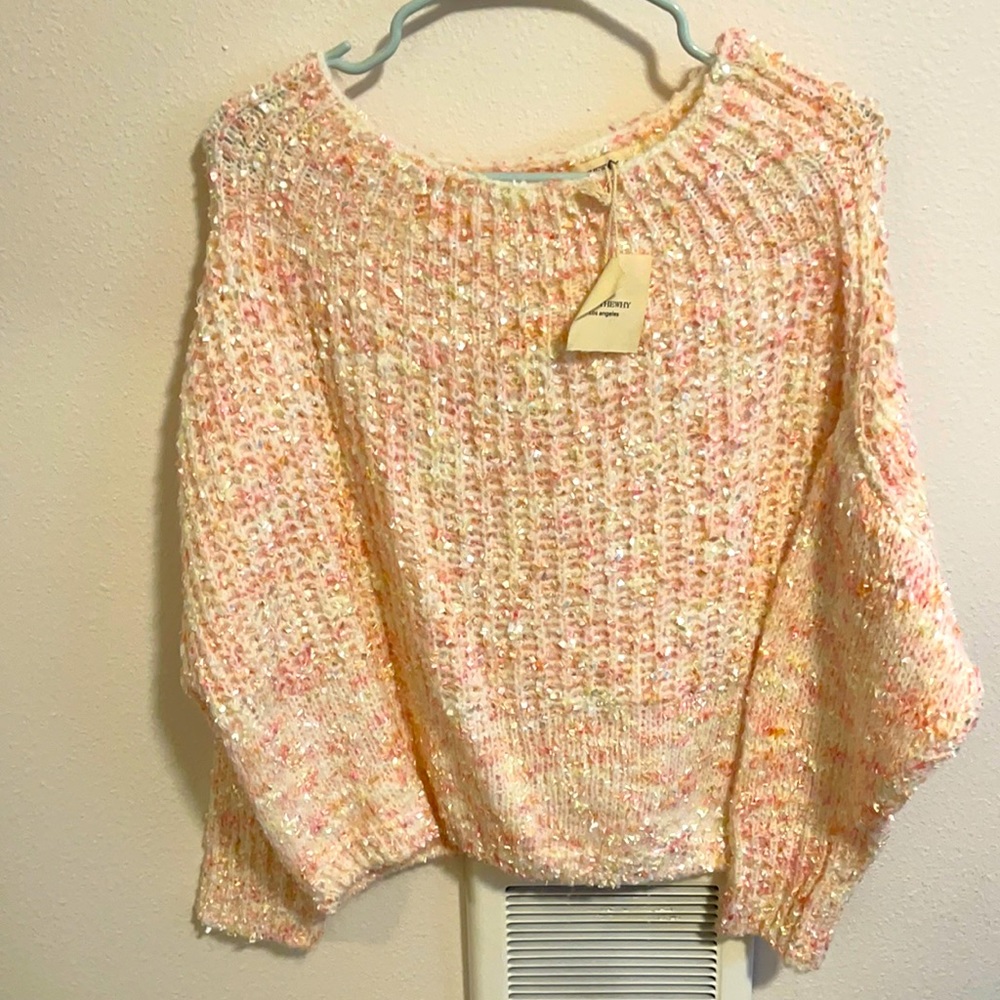And the why Los Angeles pastel colored sweater